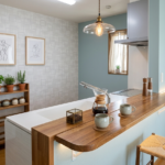 サムネイル:完成 ホーロー素材のシステムキッチンに入れ替え、傷がつきにくく掃除も楽。大容量の収納も魅力です。